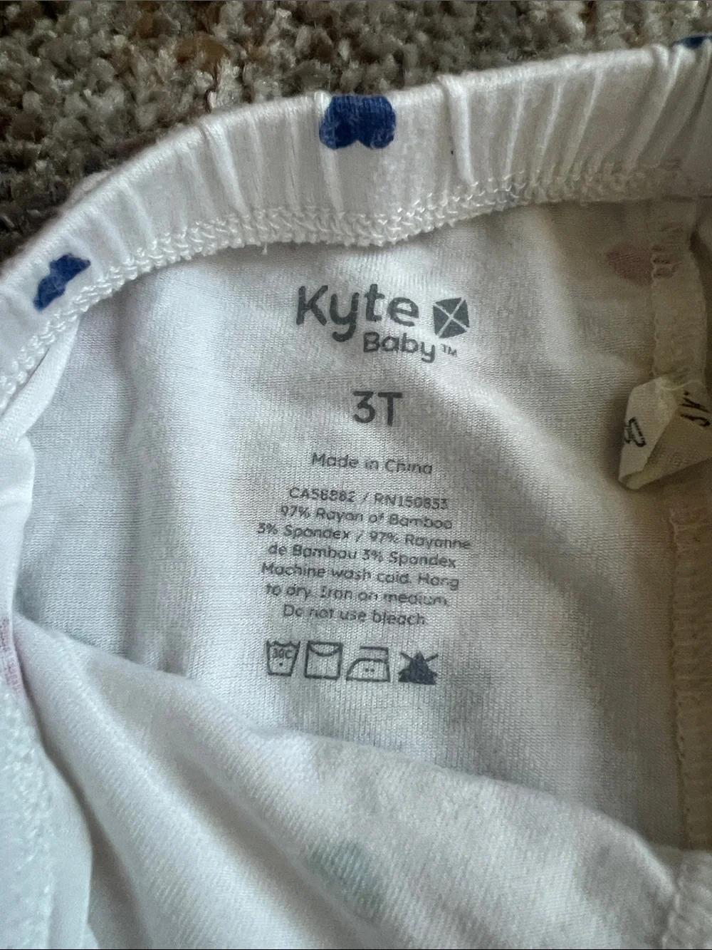 Kyte BABY White Pajama Set with Multicolor Hearts and Red Trim